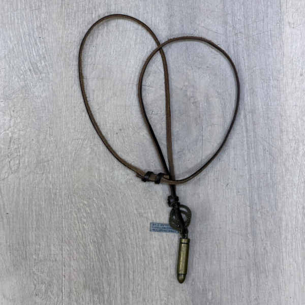 A leather necklace with a real bullet attached